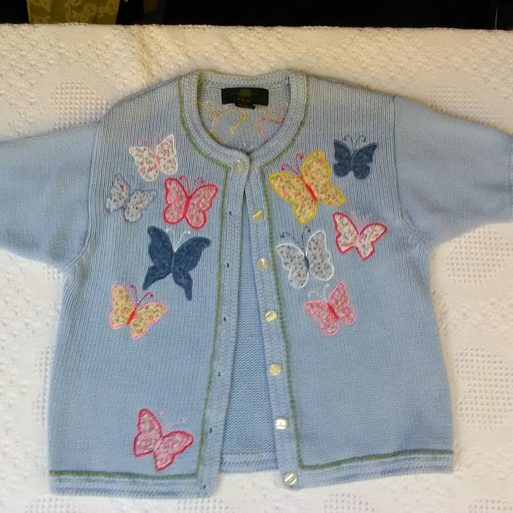 Cute light blue butterfly print short sleeved sweater top